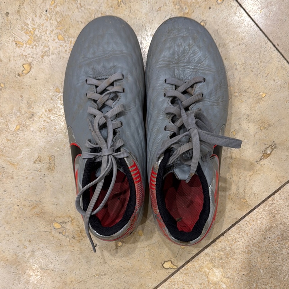 Gray and Red Nike Soccer/Football Shoes